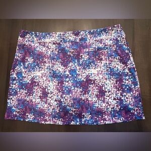 TOURNAMENT COLLECTION WOMEN’S SIZE XL SKORT.   PURPLE/BLUE/WHITE.  LIKE NEW